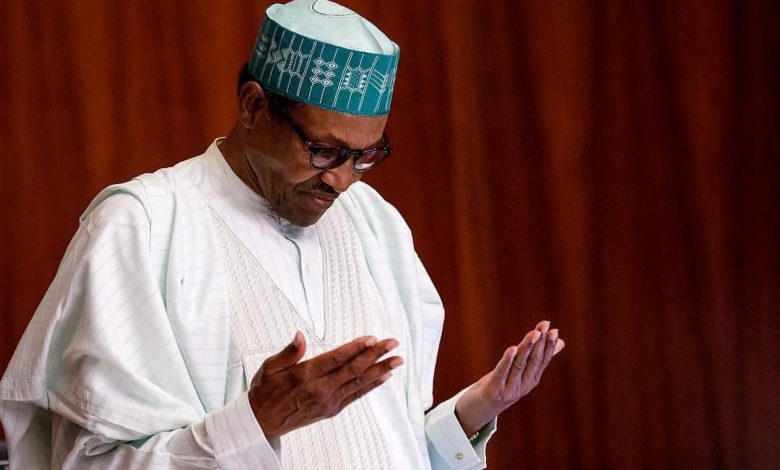 Buhari praying