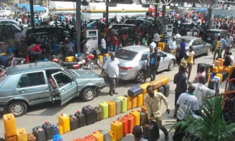 NNPCL reduces fuel depot price to N148 to end scarcity 1 Fuel queue