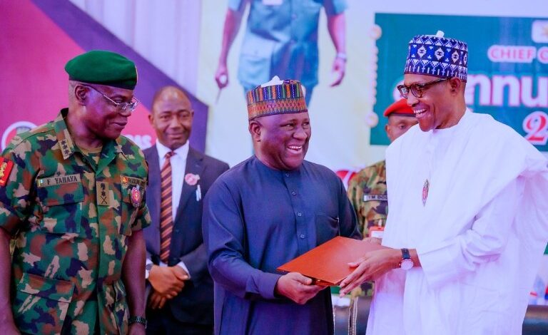 Accolades as Buhari presents another award to BUA Chairman, Abdul Rabiu 1 abc