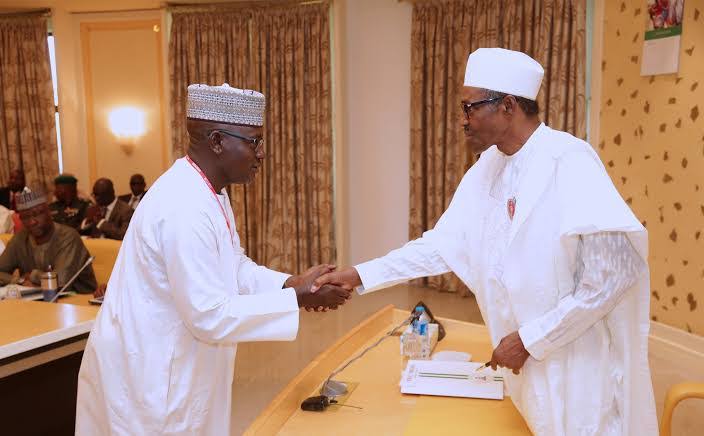 Buhari greets FIRS Chairman, Muhammad Nami, at 55 1 images 58