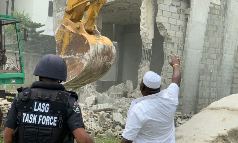 Pix 5 GM LASBCA Arc. Gbolahan Oki and Task Force Chairman CSP Shola Jejeloye during the demolition
