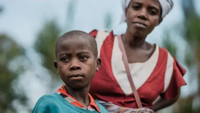 DRC remains epicentre of child suffering in war as country tops world list of grave violations against children 10 CH1807799 Mona 40 and her son Elias 12