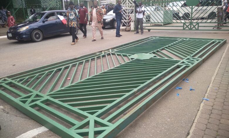 Protesters pull down National Assembly gate 1 Picture of the broken gate as seen on Wednesday