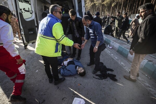 Iran says at least 95 were killed in blasts at a ceremony honoring slain general 3 download 5