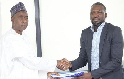 A representative of the EFCC and Flutterwave CEO Olugbenga Agboola