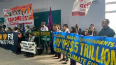 Climate Change: EU raises $300bn to help developing nations 4 Activists with banners and flags hold a gathering to demand that rich countries help developing nati1