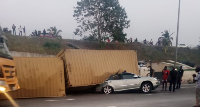 3 escaped death as container falls on motor car in Lagos 1 Lagos accident1