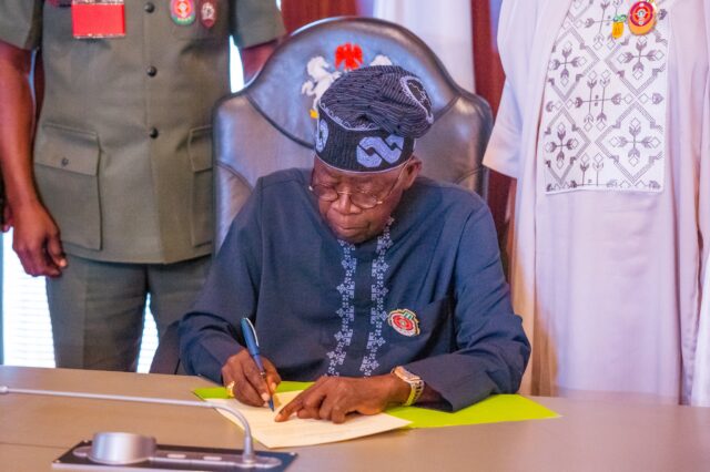 BREAKING: President Tinubu signs four landmark tax reform bills into law 1 Tinubu signs 1 640x426 1
