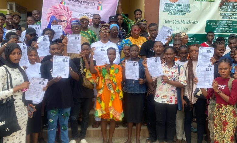 Beneficiaries of the free JAMB forms and the Acting Chairman, Oladipupo Oluwaloni (OLO 1)
