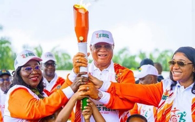 Umo Eno receives unity torch ahead of Akwa Ibom Sports Festival 1