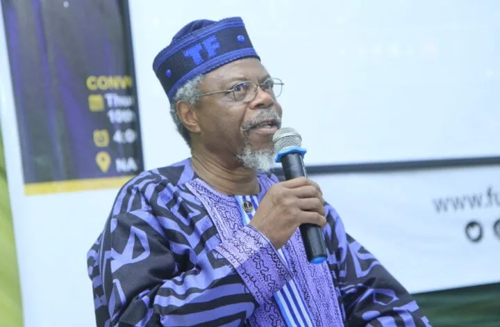 Professor Falola delivering the lecture at the colloquium held in his honor by the Fountain University Osogbo. scaled e1642155860213